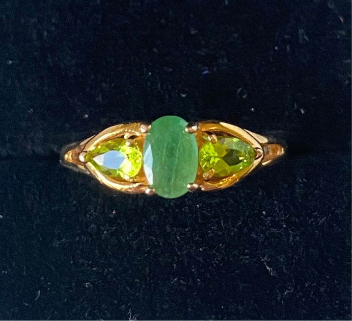 Yellow gold emerald and peridot ring