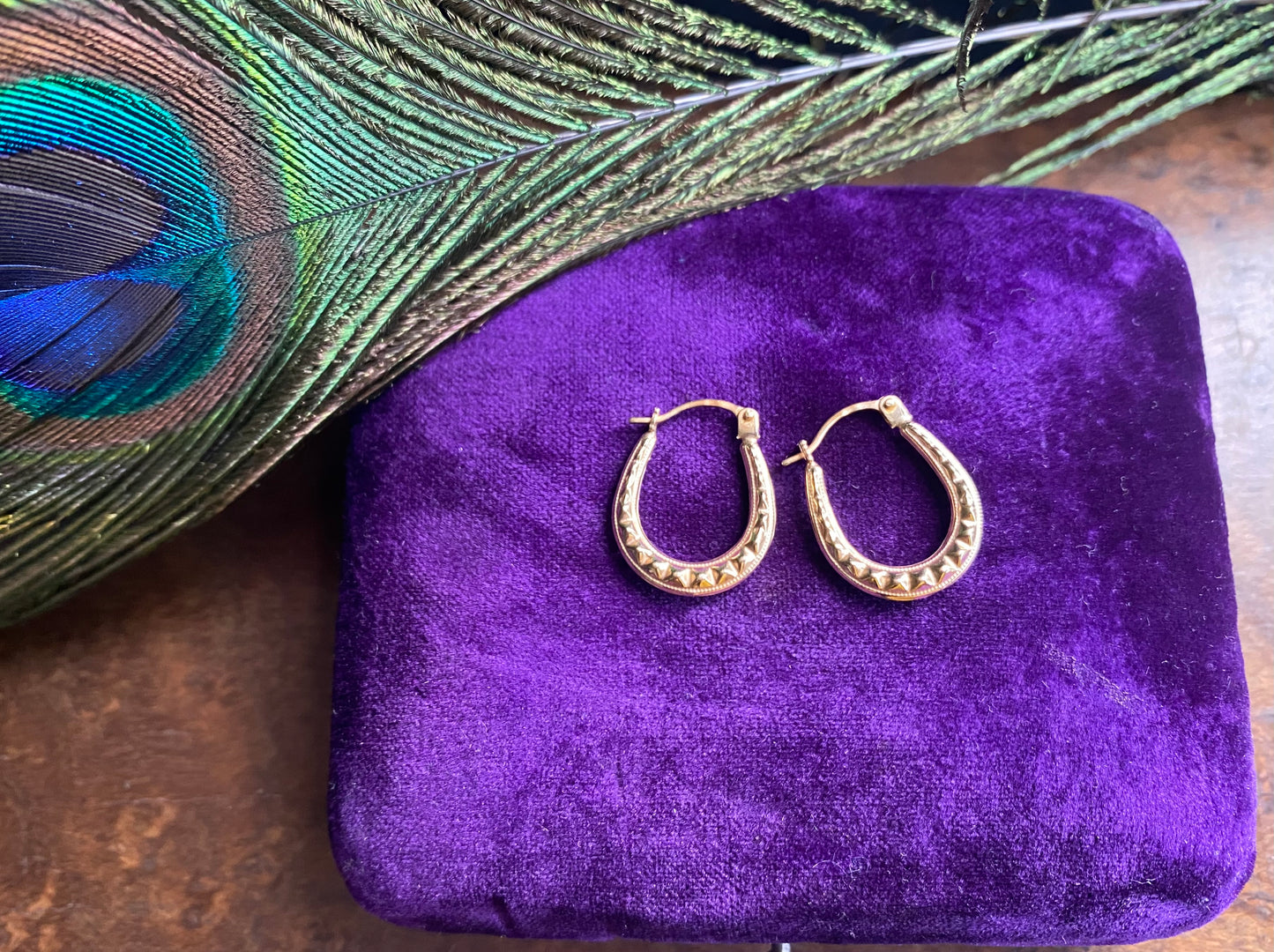 Gold studded U-shaped hoops