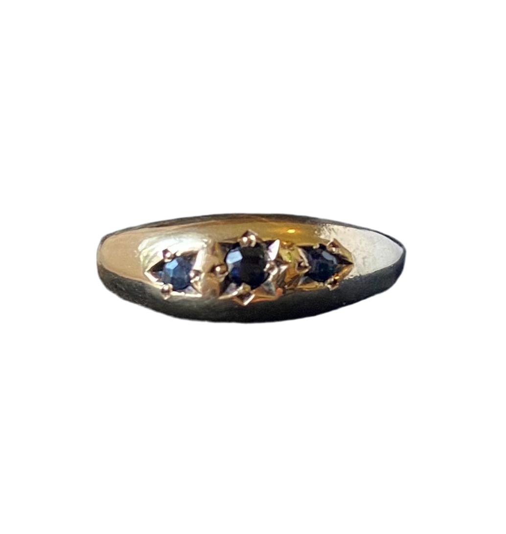 Gold and sapphire gypsy band ring