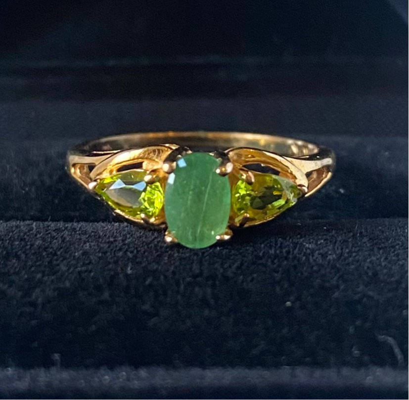 Yellow gold emerald and peridot ring