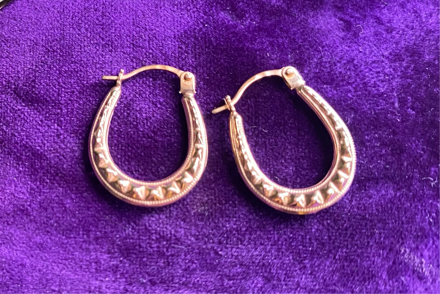 Gold studded U-shaped hoops