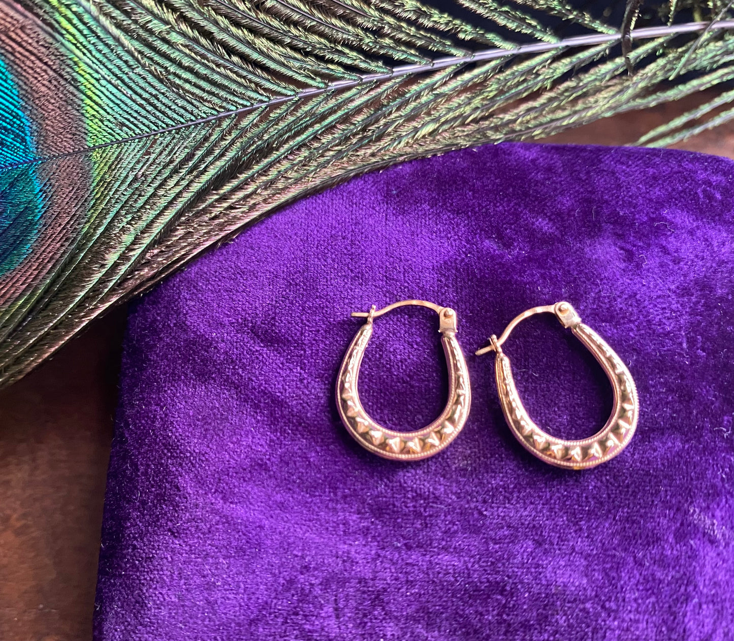 Gold studded U-shaped hoops