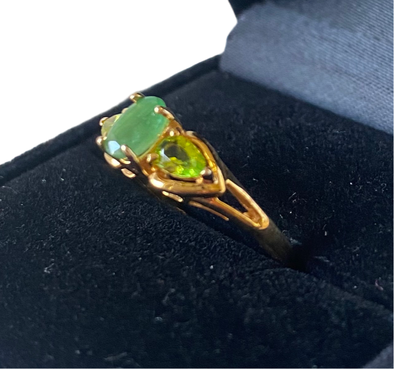 Yellow gold emerald and peridot ring