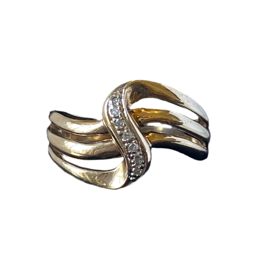 Vintage from the nineties gold and diamond fantasy swirl ring