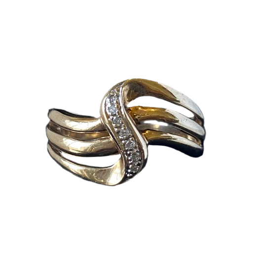 Vintage from the nineties gold and diamond fantasy swirl ring