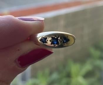 Gold and sapphire gypsy band ring